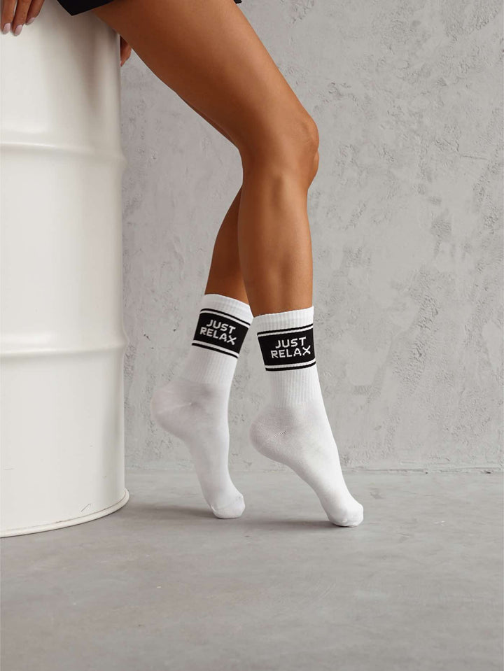 White cotton ankle socks for women featuring “Just Relax” pattern, soft, breathable, and ideal for casual daily comfort