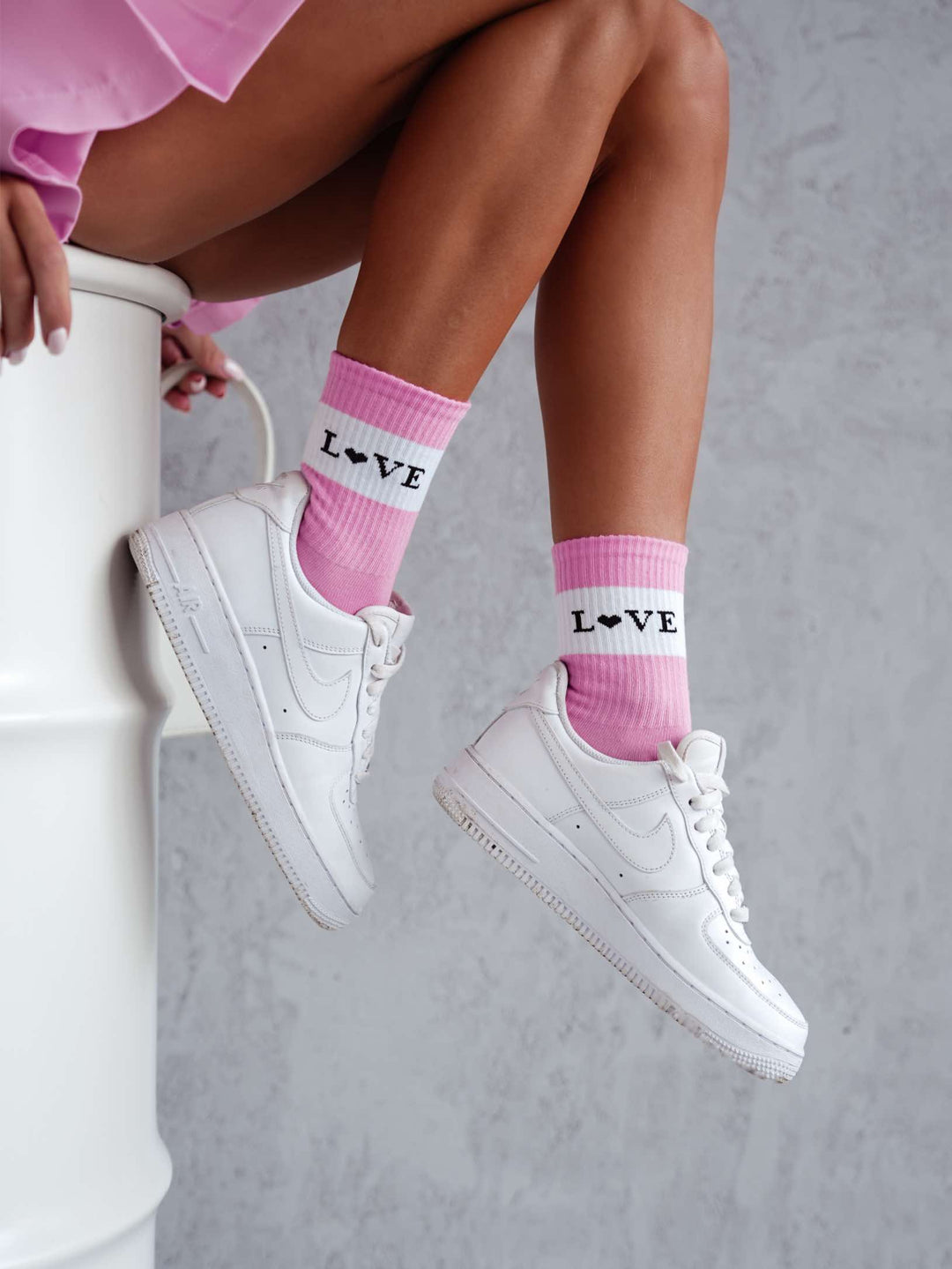 Women’s pink cotton ankle socks featuring love pattern. Lightweight, breathable socks designed for comfort and cute casual outfits