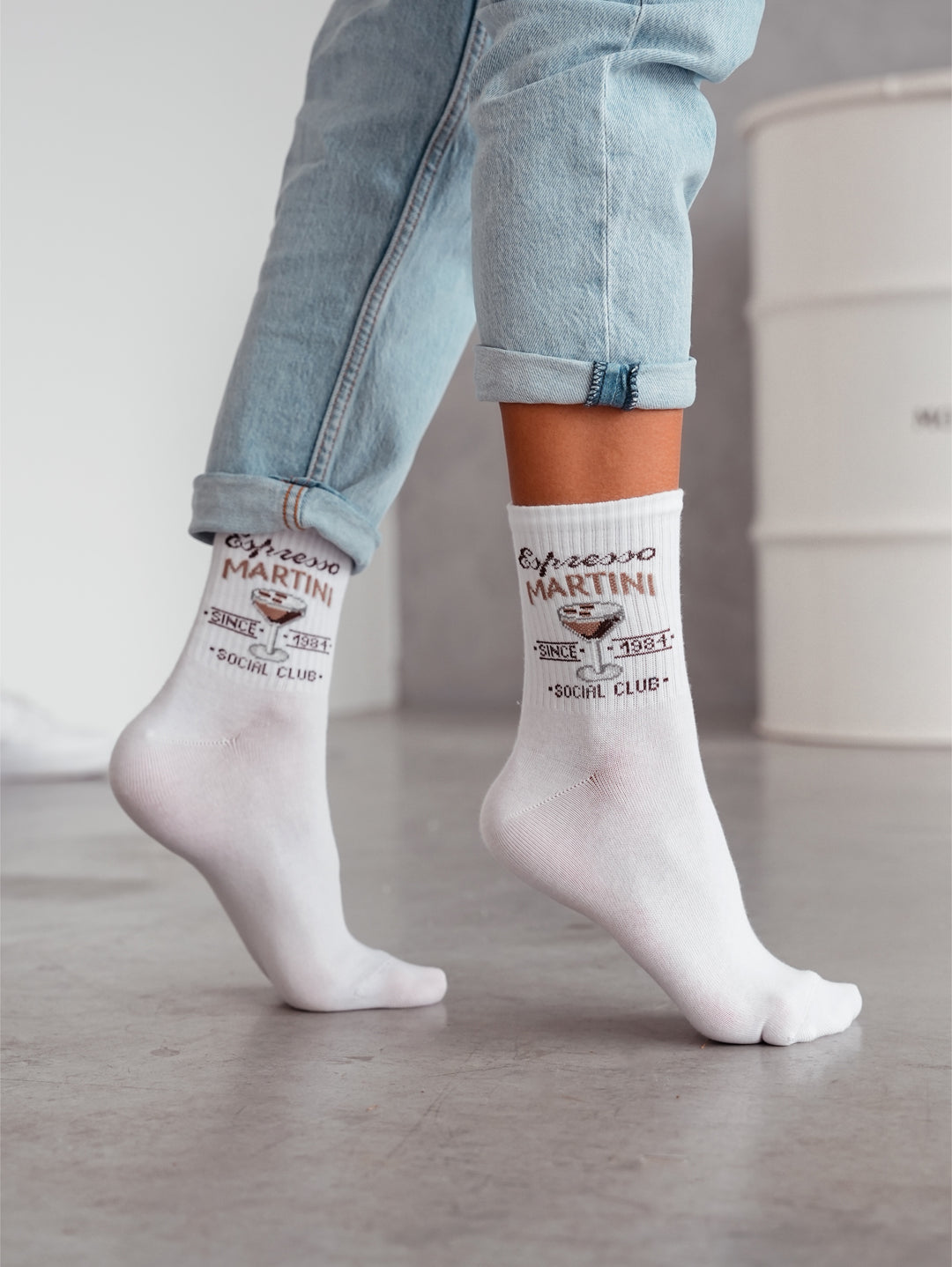 White cotton socks from Spanties featuring an espresso martini design, perfect for comfort and minimalist daily styling