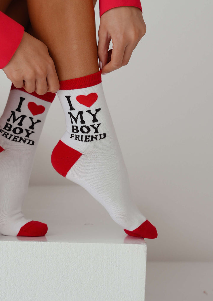 Bold black ankle socks with expressive “I Love My Boyfriend” lettering, combining breathable cotton comfort with edgy everyday fashion