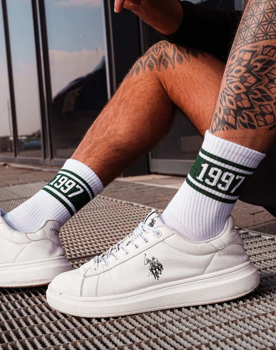 Men’s white and green sports socks with 1997 pattern and elastic ribbed cuffs for a snug, pressure-free fit