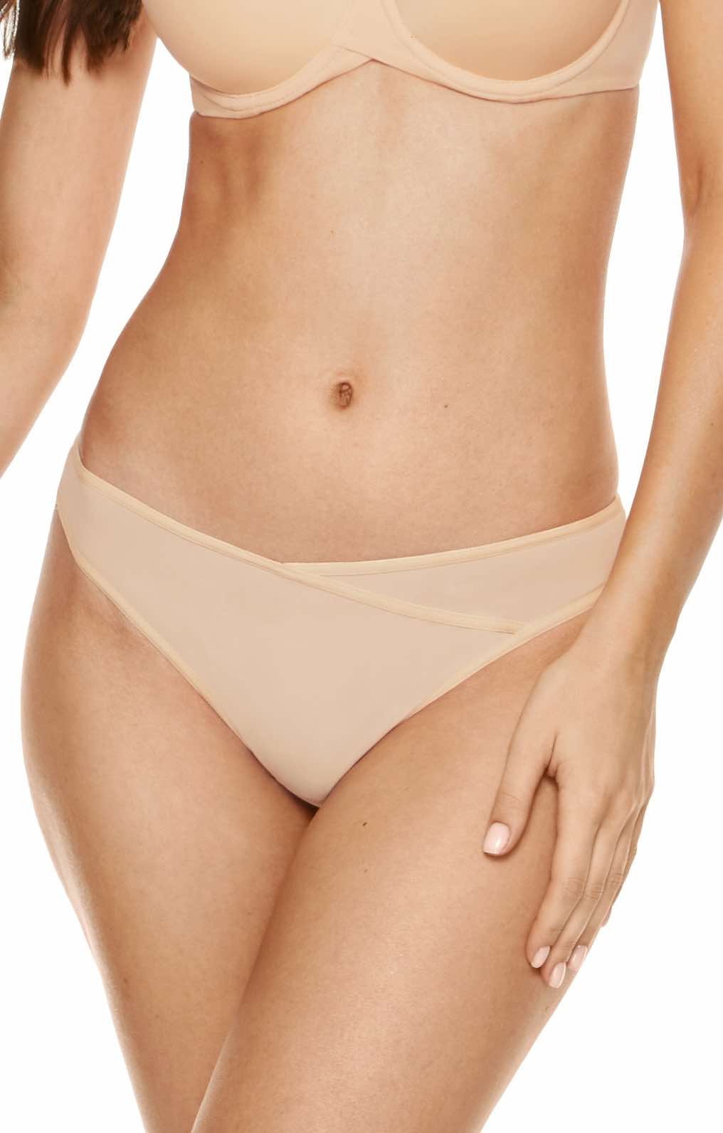 Beige Brazilian thong with seamless fit and soft fabric, designed for comfort and invisible wear under clothing