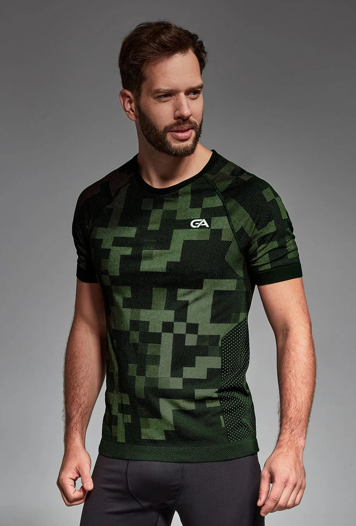 Model in black and green active performance T-shirt featuring breathable, quick-dry material and ergonomic design for active lifestyles
