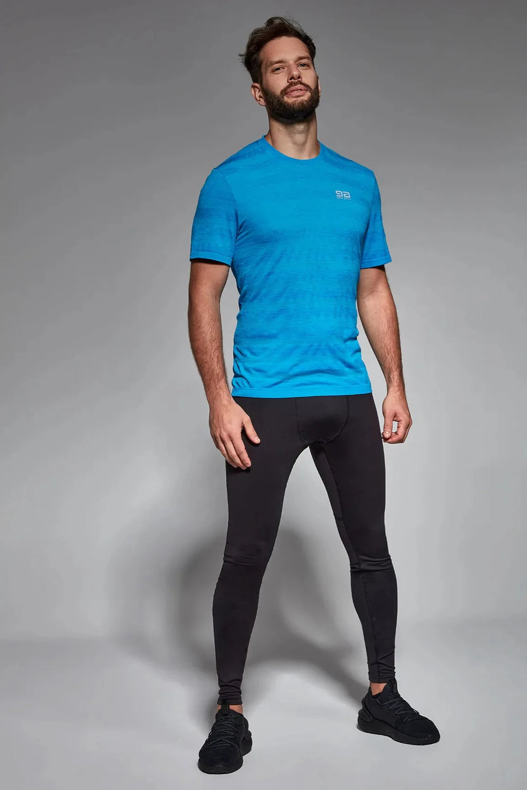 Bright blue active T-shirt with lightweight, quick-dry fabric and performance fit, designed for high-energy training and sports